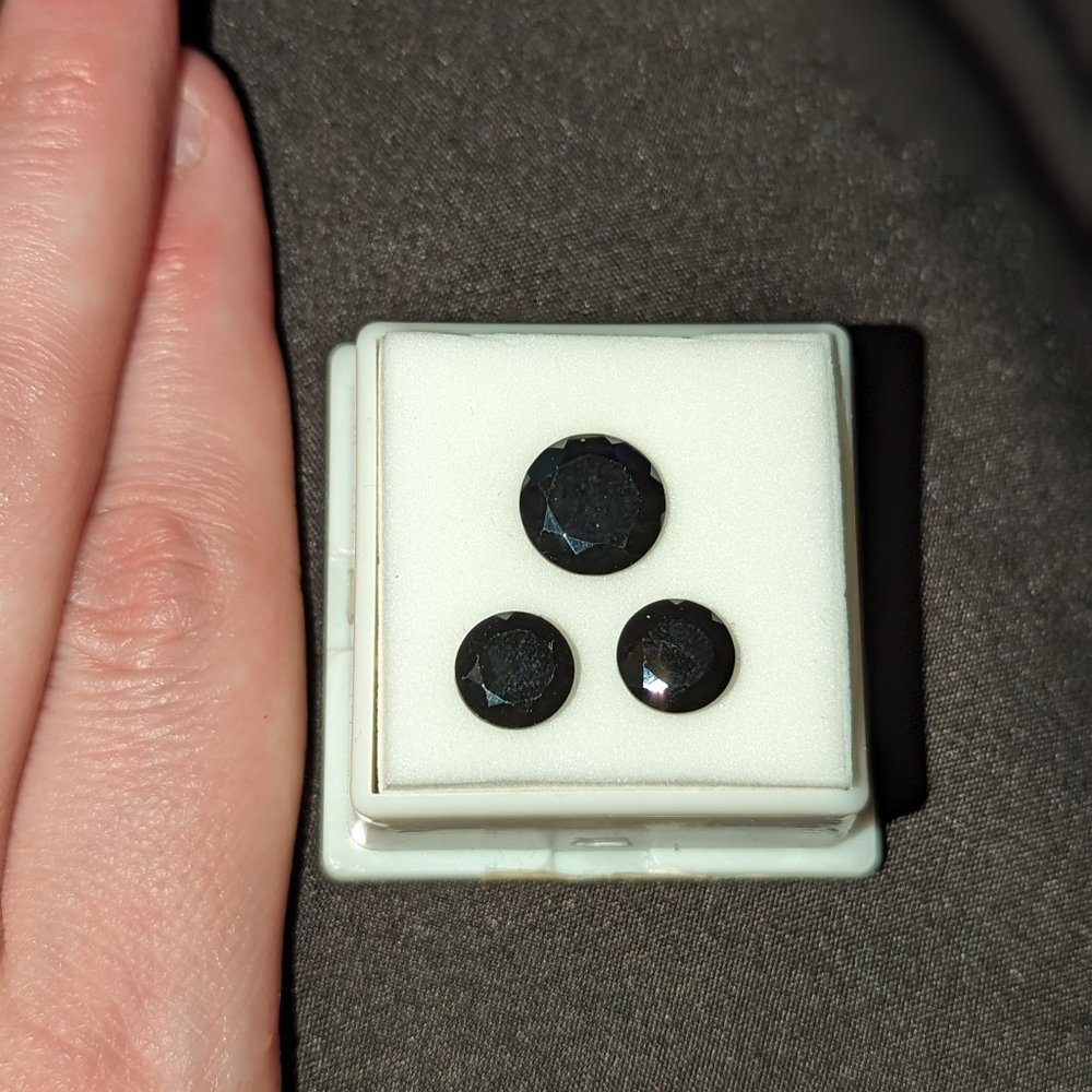 Three faceted black spinels natural -